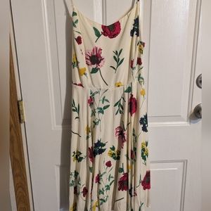 Colorful summer dress with poppies and daisies